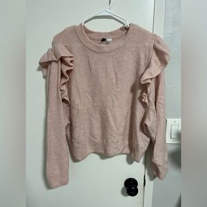 Pink sweater with ruffles